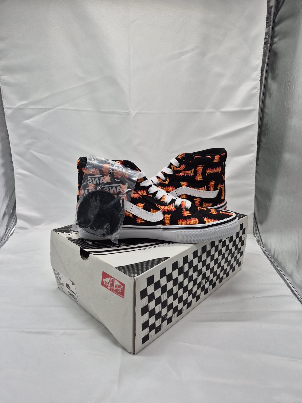Vans High-Top Sneakers in Black with Orange Flame Print